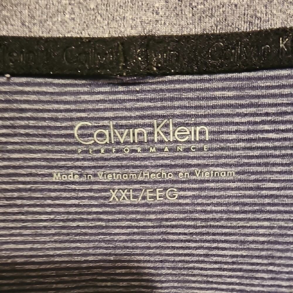 Calvin Klein Blue Polo Shirt with Soft Heathered Texture - Picture 2 of 4